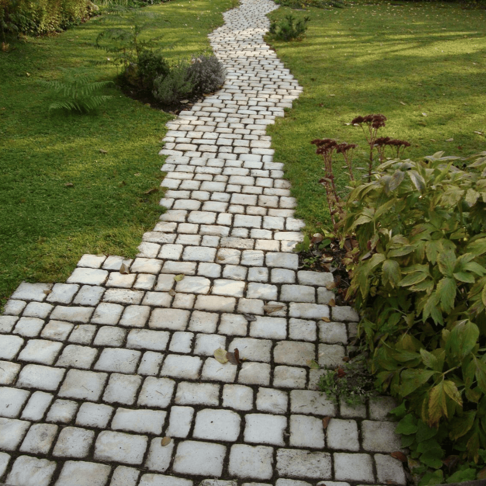 natural stone walkway through garden
