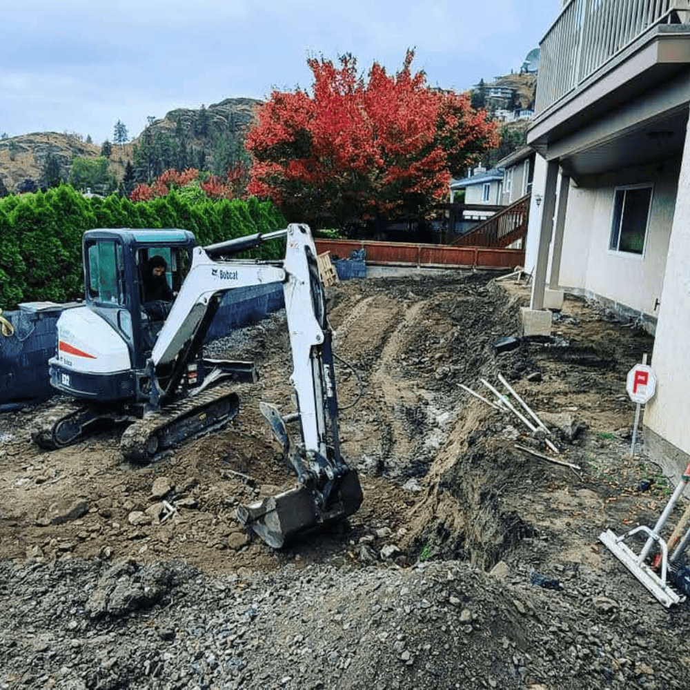 excavator preparing a backyard