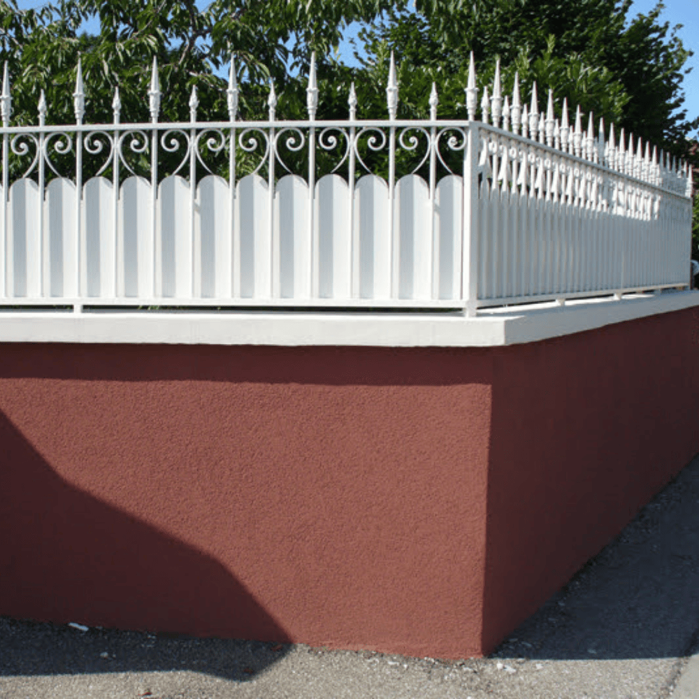 Ornate perimeter wall with victorian style fence