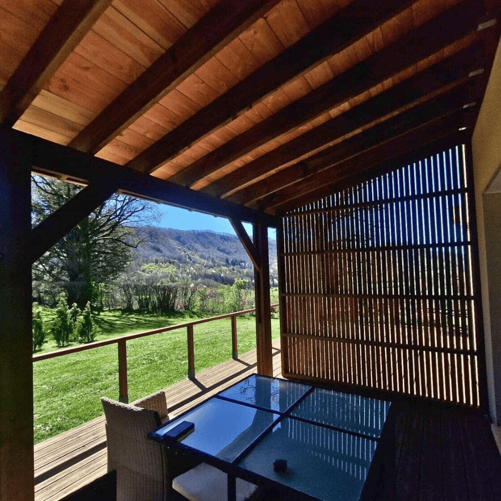 Wooden lean-to covered pergola