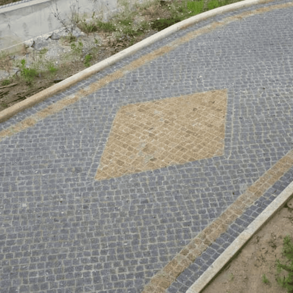 cobblestone walkway with intricate design